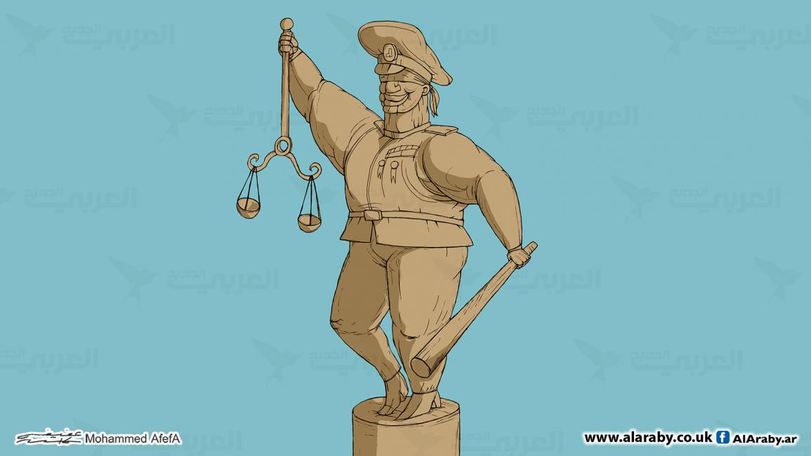 كاريكاتير ميزان العدالة / ابوعفيفة