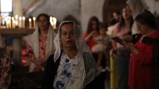 أحد الشعانين في كنيسة القديس برفيريوس الأرثوذكسية في مدينة غزة 1 - 28 إبريل 2024 (داوود أبو الكاس/ الأناضول)