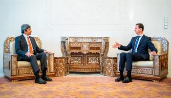 بشار الأسد خلال استقباله وزير الخارجية الإماراتي عبد الله بن زايد آل نهيان (Getty)