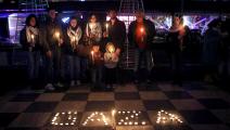 فلسطينيون في اليونان يحتجون بالشموع على انقطاع الكهرباء بغزة
