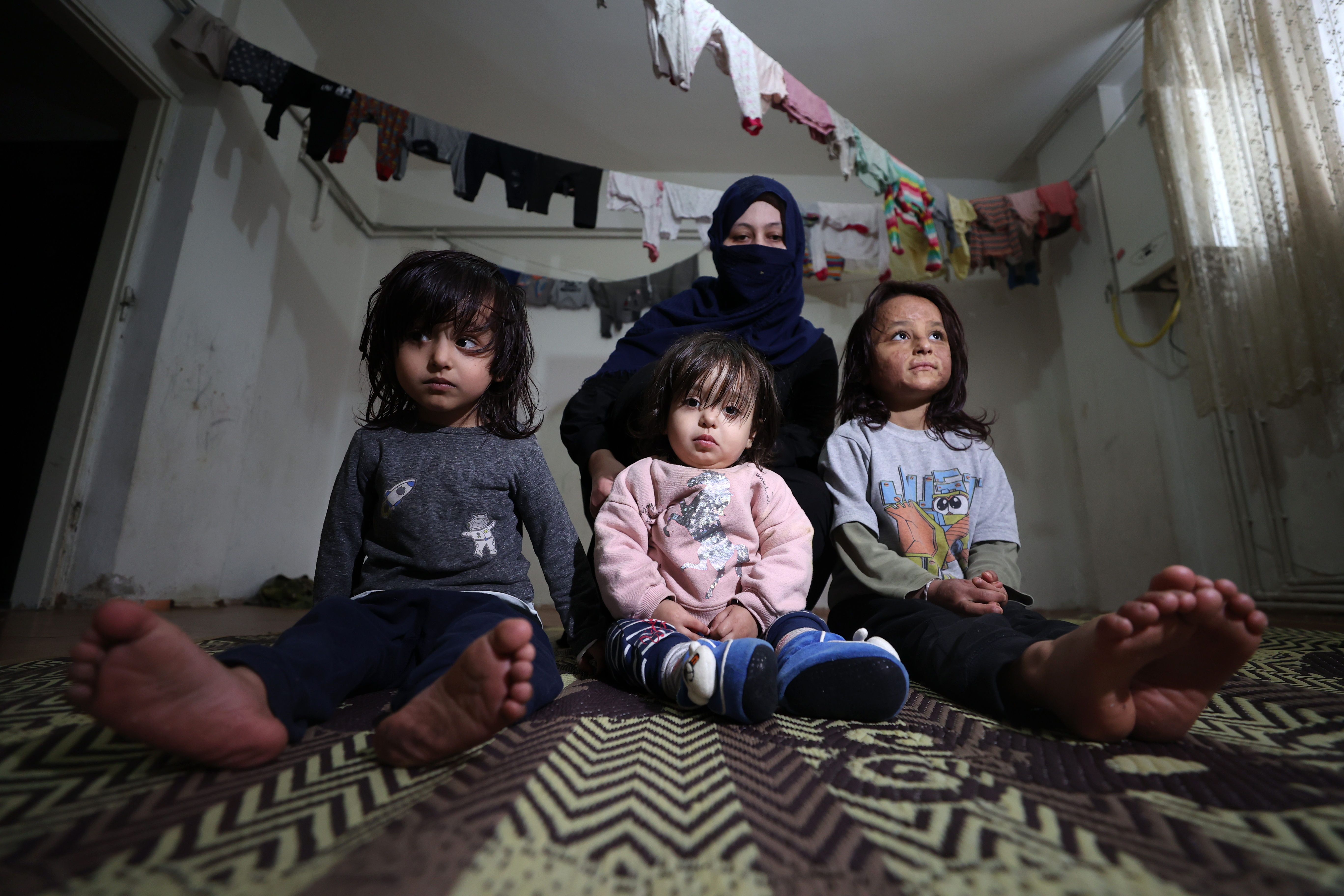 عائلة سورية لاجئة إلى بورصة (علي اتمكا/ الأناضول) 