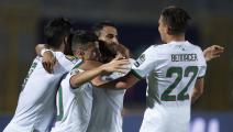 CAIRO, EGYPT - JULY 07: Riyad Mahrez of Algeria celebrates his goal with Youcef Atal, Baghdad Bounedjah and Ismael Bennacer during the 2019 Africa Cup of Nations Round of 16 match between Algeria and Guinea at 30th June Stadium on July 07, 2019 in Cairo, Egypt. (Photo by Visionhaus)	