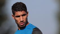 COMO, ITALY - SEPTEMBER 09: Achraf Hakimi of FC Internazionale looks on during the FC Internazionale training session at the club's training ground Suning Training Center in memory of Angelo Moratti on September 9, 2020 in Como, Italy. (Photo by Emilio Andreoli - Inter/Inter via Getty Images)	