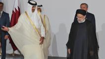 أمير قطر رفقة الرئيس الإيراني (كريم جعفر/ فرانس برس)