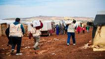 توزيع مساعدات في مخيمات النزوح السورية (قطر الخيرية)