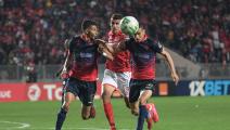 Wydad's Hamza Asrir and Abdellatif Noussir attempt to block Etoile's Karim Aribi during the CAF Champions League quarter-final football match between Tunisia's Etoile Sportive du Sahel and Morocco's Wydad Casablanca at the Stade Olympique de Rades, southeast of the Tunisian capital Tunis, on March 7, 2020. (Photo by Fethi Belaid / AFP) (Photo by FETHI BELAID/AFP via Getty Images)