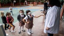 Turkey Reopens Schools To First Grade Students Amid Coronavirus Pandemic ISTANBUL, TURKEY - SEPTEMBER 21: First grade students wearing protective face masks line up to have their temperature taken before entering the school building at the Florya Ugur College on September 21, 2020 in Istanbul, Turkey. For the first time since schools closed on March 16, due to the coronavirus outbreak, kindergarten and first grade students were allowed to return for in-person classes at schools across Turkey. The one day a 