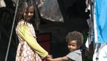 طفلان لجآ وعائلتهما إلى السودان هرباً من تيغراي (محمود حجاج/ الأناضول)