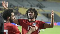 Egypt's midfielder Mohamed Elneny (R) celebrates with Egypt's forward Mohamed Salah (L) after one of their teammate scored a goal during the Africa Cup of Nations qualifier football match Egypt vs Tunisia at the Borg El Arab Stadium, near Alexandria, on November 16, 2018. (Photo by KHALED DESOUKI / AFP) (Photo credit should read KHALED DESOUKI/AFP via Getty Images)