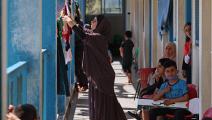 فلسطينيون مهجرون في مدرسة أونروا في غزة (محمد عابد/ فرانس برس)