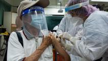 خلال تطعيم كبار السن في تايوان (أنابيل شيه/ Getty)