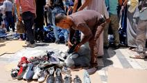 في سوق للأحذية والملابس المستعملة في عمّان (أحمد غرابلي/ فرانس برس)