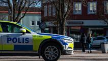 شرطة وأطفال في السويد (جوناثان ناكستراند/ فرانس برس)