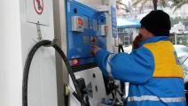 An officer checks a gas pump, on January 6, 2009 at the fuel-oil station in Istanbul. Turkey's energy minister said that the flow of Russian natural gas through a pipeline via the Balkans had been cut over a row between Russia and Ukraine, Russia started pumping more gas to Turkey via the Blue Stream conduit, which runs under the Black Sea and links the two countries directly, he said, adding that the amount was increased from 40 to 48 milllion cubic metres per day. AFP PHOTO / BULENT KILIC (Photo credit sh