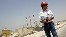 مهندس إيراني في موقع إنتاج الغاز في حقل بارس الجنوبي (فرانس برس)
