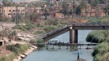 الجسر المعلق في دير الزور دمرته الحرب (Getty)