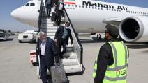 Passengers get off from a privately owned Iranian airline Mahan Air flight at the airport in Kabul on September 15, 2021. (Photo by Karim SAHIB / AFP) (Photo by KARIM SAHIB/AFP via Getty Images)