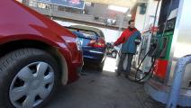 An Egyptian worker fills a customer's car tank at a petrol station in Cairo on January 16, 2012 amid fears of an oil shortage. AFP PHOTO / KHALED DESOUKI (Photo credit should read KHALED DESOUKI/AFP via Getty Images)