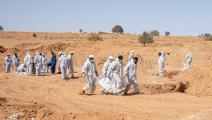 ضحايا مقابر جماعية في ترهونة في ليبيا (ندى حرب/Getty)