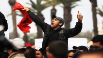 مغاربة يتظاهرون ضد النظام بقيادة الملك محمد السادس في 20 فبراير 2011 في الرباط/ جيتي