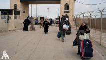 مسافرين عبر معبر بري بين العراق وإيران (وكالة الأنباء العراقية)