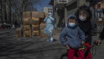 كورونا وكمامات في الصين (كيفن فريير/ Getty)