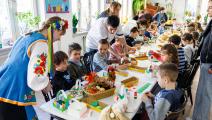 أطفال أوكرانيون في ألمانيا (ينس شلوتر/ Getty)