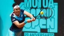 MADRID, SPAIN - MAY 02: Ons Jabeur of Tunisia in action against Belinda Bencic of Switzerland in her third round match on Day 5 of the Mutua Madrid Open at La Caja Magica on May 02, 2022 in Madrid, Spain (Photo by Robert Prange/Getty Images)	