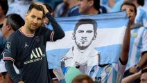 Argentina's fans hold a flag with a picture of Argentina's forward and captain Lionel Messi during a quarter-final football match between Argentina and Belgium at the Mane Garrincha National Stadium in Brasilia during the 2014 FIFA World Cup on July 5, 2014. AFP PHOTO / JUAN MABROMATA (Photo by JUAN MABROMATA / AFP) (Photo credit should read JUAN MABROMATA/AFP via Getty Images)