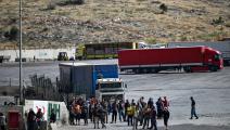 قافلة مساعدات على الحدود السورية، يونيو الماضي (أوزان كوزه/فرانس برس)