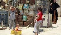 عائلة عراقية فقيرة في العراق (حيدر الحمداني/ فرانس برس)