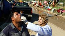 لقاح ضد الكوليرا في العراق في عام 2015 (صباح عرار/ فرانس برس)