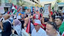 الفلسطينيون يحيون فعالية إحياء اليوم الوطني لاسترداد جثامين الشهداء (العربي الجديد)