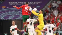 DOHA, QATAR - DECEMBER 10: Youssef En-Nesyri of Morocco scores the team's first goal during the FIFA World Cup Qatar 2022 quarter final match between Morocco and Portugal at Al Thumama Stadium on December 10, 2022 in Doha, Qatar. (Photo by Tullio Puglia - FIFA/FIFA via Getty Images)
