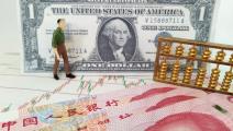 تدفق الاستثمارات الآسيوية على الدولار بسبب أزمة الين واليوان (Getty)