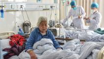 مصابون بكورونا في مستشفى في الصين (شلدون كوبر/ Getty)