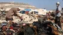 حريق سابق في مخيم للنازحين في سورية (عارف وتد/ فرانس برس)