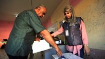 يتيح القانون ضياع أصوات الناخبين للمرشح المنفرد (مرتضى السوداني/الأناضول)