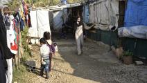 لاجئون سوريون في مخيم في لبنان (محمود غلدي/ الأناضول)