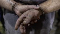 توقيف مروج مخدرات في العراق (يونس محمد/ Getty)