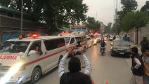 سيارات إسعاف في موقع الهجوم على مدرسة منطقة كرم (علي أفزل/ فرانس برس)
