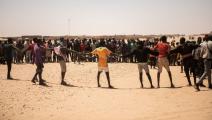 مهاجرون في أساماكا في النيجر بعد ترحيل من الجزائر (ستانيسلاس بوييت/ فرانس برس)