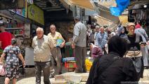 فلسطينيون في سوق في القدس قبل عيد الأضحى 2023 (العربي الجديد)