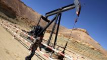 عنصر أمني في حقل الغاني النفطي (عبد الله دوما/ فرانس برس)