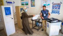 عراقية تقترع في الانتخابات البرلمانية، أكتوبر 2021 (مرتضى السوداني/الأناضول)