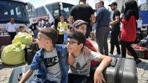 سوريون في تركيا في عملية عودة طوعية سابقة (أوزان كوسه/ فرانس برس)