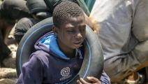 طفل مهاجر في البحر الأبيض المتوسط (ياسين قايدي/ الأناضول)