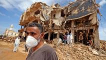 عمال بحث وإنقاذ في درنة في ليبيا (كريم صاحب/ فرانس برس)