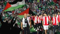 لاعبو الجزائر أوفياء للقضية الفلسطينية (العربي الجديد/الاتحاد الجزائري/Getty)