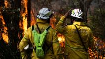 رجال إطفاء وحريق غابات في أستراليا (أستون براون/ فرانس برس)